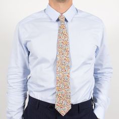 Le Colonel loves this Safran Liberty Ava classic tie! A beautiful tie with magnificent flowers. The perfect touch to improve your outfit!Sewn and hand-finished with love in our Lille workshop 100% Liberty Cotton100% Cotton lining Elegant Cotton Ties For Spring, Spring Business Cotton Suit And Tie Accessories, Elegant Cotton Ties For Gifts, Formal Cotton Ties With Floral Print, Classic Spring Suit And Tie Accessories For Semi-formal, Classic Formal Ties With Floral Print, Cotton Ties For Workwear In Spring, Classic Multicolor Office Ties, Summer Formal Ties With Floral Print