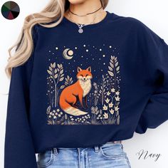 Fox and Moon Unisex Crewneck Sweatshirt | Boho Jumper | Cottagecore Clothes | Forest Animal Sweatshirt ✔️ Super comfy unisex heavy blend crewneck sweatshirt  ✔️ 50% cotton 50% polyester ✔️ Medium-heavy fabric (8.0 oz/yd² (271.25 g/m ✔️ No side seams ✔️ Ribbed knit elastic collar to help collar retain its shape ✔️ Sewn-in label 📏 Runs true to size ✨ Care instructions: Machine wash: cold (max 30C or 90F). Turn inside out before washing to protect the print. Non-chlorine: bleach as needed. Tumble Fox And Moon, Autumn Jumpers, Cottagecore Clothes, Animal Sweater, Boho Pullover, Fox Sweater, Fox Gift, Animal Sweatshirt, Forest Animal