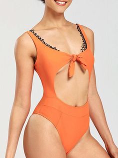 This swimsuit uses an interesting front knot design and an eye-catching tailoring design to create a pleasing silhouette and add cuteness and lightness to your next beach vacation. Swimsuit Type:One-piece Gender: Female Material: Polyester Neckline: V-neck Decoration: Hollow. Tie Waist: Natural 2 Piece Jumpsuit, Vacation Swimsuit, Slim Cardigan, Split Sweater, Flare Jumpsuit, Knot Design, Tailored Design, Womens Bathing Suits, Long Hoodie