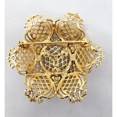 1960s or 1970s goldtone openwork brooch with security clasp. Marked "MONET©." Measures: 2 1/8 inches long by 2 3/8 inches wide. Excellent condition. Monet Jewelry, Vintage Signs, 1970s, 1960s, Gold Tones