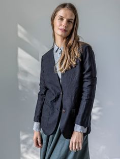 "A collarless linen jacket for a more casual yet just as refined look. For a more classic option with collar, check our beloved jacket FOCUS. STYLE DETAILS * Regular fit * 2 buttons * 2 patch pockets at the front * No lining * French seams inside * Made from medium-weight linen SIZES & COLORS IN PICTURES * Model wears size S/M in color Black. She is 176 cm (5'9\"). Bust - 81 cm (32\"), waist - 67 cm (26\"), hips - 90 cm (35\"). NOTES ON SIZING & COLORS * Please note that linen shrinkage during the softening process cannot be predicted precisely. Therefore, each piece in the same size can vary 1-2 cm. * The actual color may be slightly different due to screen settings. If the exact color is important to you, we advise ordering the Color Guide. MAKE-TO-ORDER / CUSTOMIZATION * This is a make- Business Linen Outerwear, Classic Linen Blazer With Button Closure, Business Casual Linen Blazer With Buttons, Business Casual Linen Blazer With Button Closure, Linen Blazer With Hidden Button Closure, Business Linen Button-up Blazer, Linen Button-up Blazer For Business, Linen Button-up Blazer For Business Casual, Business Casual Linen Button-up Blazer