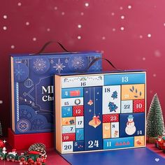 a wooden calendar with christmas decorations on the side and snowflakes in the background