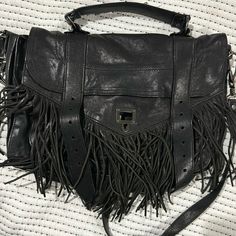 Black Fringe Leather. This Bag Was Kept In A Dust Bag And Has Little Signs Of Wear. It’s Such A Unique Style Of The Bag And Not One You See L. Black Party Bag With Palladium Hardware, Black Flap Satchel Bag With Dust Bag, Black Satchel Flap Bag With Dust Bag, Trendy Travel Bag With Palladium Hardware, Designer Black Saddle Shoulder Bag, Black Shoulder Bag With Palladium Hardware For Party, Black Party Bags With Gunmetal Hardware, Black Saddle Bag With Detachable Strap For Shopping, Chic Black Saddle Bag For Shopping