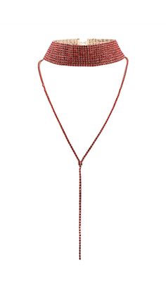 a red beaded choker with a long tassel on the side and a gold chain