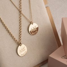 Personalized Couples Necklace Set with Initials and Anniversary Date Now you, or a loved one or special friend, can make a stylish and personal fashion statement with this elegant Personalized Couples Necklace Set with Initials and Anniversary Date. This exquisite personalized couples necklace set will make a very thoughtful gift for someone special, and will be greatly appreciated for years to come. The personalized couples necklace set includes two necklaces with round pendants featuring two i Elegant Jewelry For Anniversary Gift With Hallmarks, Anniversary Jewelry With Initial Pendant Hallmarks, Elegant Customizable Necklace For Anniversary Gift, Elegant Customizable Necklace For Anniversary, Gold Wedding Jewelry Gift, Classic Personalized Necklace For Anniversary Gift, Classic Personalized Necklaces For Anniversary Gift, Elegant Initial Pendant Jewelry For Anniversary, Classic Jewelry For Anniversary And Mother's Day