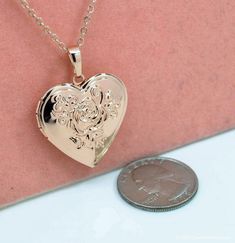 Roses Picture Locket Necklace Rose Gold Over Stainless | Etsy Valentine's Day Gift Locket Necklace For Mom, Dainty Rose Gold Heart Locket Necklace, Engraved Locket Necklace For Mom For Valentine's Day, Rose Gold Locket Necklace For Mother's Day, Rose Gold Locket Charm Necklaces For Mother's Day, Rose Gold Charm Necklaces With Locket For Mother's Day, Elegant Rose Gold Locket Necklace For Mother's Day, Rose Gold Locket Charm Necklace For Mother's Day, Mother's Day Rose Gold Locket Necklace