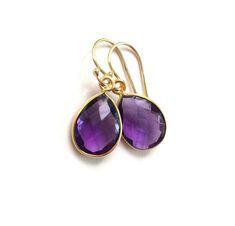 "Faceted Amethyst teardrops are incased in a Vermeil bezel. Beautiful color!! The Amethyst teardrops are Hydro quartz The Gold Filled earring wires are made in the USA. The total earring measures 1 1/4\". Lever backs are available for a $3 upgrade. To see all my other Amethyst items click here: https://www.etsy.com/shop/PhaedoraJDesigns?ref=seller-platform-mcnav&search_query=Amethyst" Earring Wires, Birthstone Earrings, Amethyst Gold, Birthstone Gifts, Gold Filled Earrings, February Birthstone, Birthstone Earring, Amethyst Earrings, February Birth Stone