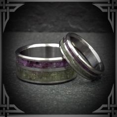 This ring is made from Titanium with a Double Groove Violet Jade  & Green Jade Stone Inlay.  Genuine semi-precious stones we use are hand picked and crushed for all of our Inlays, no synthetic or dyed stones are used. The Aerospace, Grade 5 Titanium is machined from solid stock, is hypoallergenic, extremely strong and light weight.  Available in all sizes and widths 5 to 9 mm.         The picture shows a size 10 1/4 , 9 mm wide.  We do our best to make your ring as close to the picture you order Polished Titanium Ring Jewelry, Modern Multi-stone Wedding Jewelry, Titanium Ring For Anniversary, Silver Titanium Promise Jewelry, Polished Titanium Ring, Anniversary Gemstone Rings In Stainless Steel, Anniversary Stainless Steel Rings With Gemstones, Anniversary Stainless Steel Gemstone Rings, Silver Titanium Wedding Rings