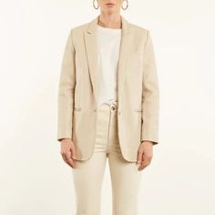 Step up your fashion game with our Off-White Lambskin Leather Blazer for Women. Made with high-quality lambskin leather, this blazer is the perfect addition to any stylish wardrobe. This blazer will make you feel confident, powerful, and stylish. You will turn heads wherever you go and feel comfortable while doing it. Whether you're attending a formal event or just running errands, this blazer will make you feel put together and ready to take on the world. Feel confident and powerful with this c Sleek White Outerwear For Office, Sleek White Outerwear For Work, Modern White Blazer For Business Casual, Cream Blazer For Business In Fall, Cream Business Blazer For Fall, White Sport Coat For Workwear In Fall, Fall Business Cream Blazer, Cream Notch Lapel Blazer For Fall, Beige Leather Blazer For Office