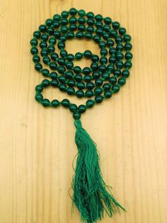 Green Onyx Hand-Knotted Mala-Green Onyx Necklace-108 Beads Japa Mala Mala Necklace -Hand Knotted Prayer Beads Meditation Beads Yoga Necklace **Length: 6 mm** **Colour: Green** **Main Stone: Green Onyx  ** **Type: Round Beads* ** Quality - AAA* Please Note that their can be a minor difference between the shade and matrix of the stone  in the picture and the color and texture in the actual product that you receive . quality and grade will be constantly best Thank you for visiting. I am constantly adding new stock so check back often We Are Manufacturer And Can Even Make Custom Order Thank You For Your Time JaipurCraftHouse Green Onyx Necklace, Knotted Mala, Yoga Necklace, Meditation Beads, Onyx Necklace, 108 Bead, Mala Necklace, Green Necklace, Green Onyx