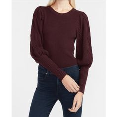 Ribbed In The Middle With Cable Knit Detail On The Puff Sleeves, This Sweater Has The Look. Wear It Your Own Way This Season. Crew Neck Long Balloon Sleeves With Cable Knit Detail Ribbed Body Straight Hem Rayon/Nylon Color: Merlot Hand Wash Fall Cable Knit Sweater With Puff Sleeves, Winter Pointelle Knit Sweater With Puff Sleeves, Winter Puff Sleeve Pointelle Knit Sweater, Stretch Puff Sleeve Sweater For Fall, Fall Ribbed Sweater With Puff Sleeves, Fall Ribbed Puff Sleeve Sweater, Knit Puff Sleeve Sweater With Stretch, Ribbed Puff Sleeve Sweater For Fall, Knit Stretch Puff Sleeve Sweater