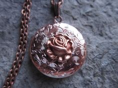 Beautiful rose gold plated round locket, I also have this in heart shaped, so please do browse my shop. AMAZING DETAILS The locket has been professionally plated with a gorgeous shiny pink 24k rose gold and an ultracoat has been added to protect finish and to add durability. The plating process has been done with high quality materials and processes. It is completely lead and nickel free and manufactured in the United States. The locket is Victorian style with beautiful etching on the front and Vintage Rose Gold Locket Necklace For Wedding, Mother's Day Rose Gold Round Locket Necklace, Rose Gold Round Locket Necklace For Gifts, Round Rose Gold Locket Necklace For Gifts, Elegant Rose Gold Locket Necklace For Mother's Day, Rose Gold Engraved Jewelry For Wedding, Engraved Rose Gold Jewelry For Weddings, Engraved Rose Gold Wedding Jewelry, Rose Gold Locket Necklace For Mother's Day Anniversary