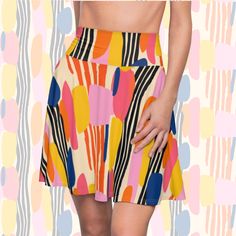 Available in a range of sizes, our circle mini skirt caters to all body types, ensuring a flattering fit for everyone. Embrace the laid-back vibes of summer and make a statement with our retro abstract pattern spandex mini skirts, available in several different pattern designs. 95% Polyester 5% Spandex A versatile fit AOP skater skirt with a cozy, soft touch and a casual look. Inspired by the freedom of creativity, it will instantly become your everyday favorite. Summer Multicolor Skort With Built-in Shorts, Stretch Mini Skirt With Built-in Shorts For Vacation, Casual Mini Skort With Wide Waistband, Stretch Flared Mini Skirt With Built-in Shorts, Trendy Stretch Flared Mini Skirt, High-waist Skirt With Wide Waistband For Summer, High Waist Skirt With Wide Waistband For Summer, Summer Flared Skirt With Wide Waistband, Relaxed Mini Skort With Wide Waistband