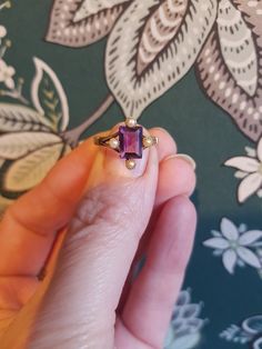 My items are not perfect. They are used, antique pieces.Genuine Victorian 9ct pale rose gold ring Size L/6 ×4 real seed pearls  X 1 real amethyst 7.5mm x 5.5 mm  Lovely antique condition as shown in photos