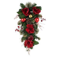 a christmas wreath with poinsettis, pine cones and berries hanging from it