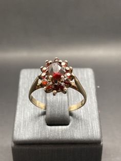 It is a Victorian style ring, estimated from 1980s, hallmarked, silver, faceted red garnet, the item in a good condition, the UK size O, the US size 7.1/4. Victorian Style Rings, Garnet Ring Vintage, Red Garnet Ring, Garnet Ring, Vintage Victorian, Garnet Rings, Multi Stone Ring, Red Garnet, Multi Stone