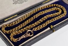 "Fancy link 10K gold chain necklace C.1890. This unrivaled hand made chain is 18 1/2\" long with the links 4 mm wide. It is equipped with large bolt ring clap 10 mm diameter and large dog clip clasp 22 mm long 7 mm wide. There is no hallmarks, tested 10K gold Total weight is 10.9 grams. Excellent antique condition. Antique jewelry box shown for display only." 10k Gold Chain, Necklace C, Bolt Ring, Antique Jewelry Box, Antique Jewelry Necklace, Dog Clip, Link Chain Necklace, Gold Chain Necklace, Chain Link Necklace