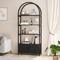 a living room filled with furniture and a white chair next to a wall mounted book shelf