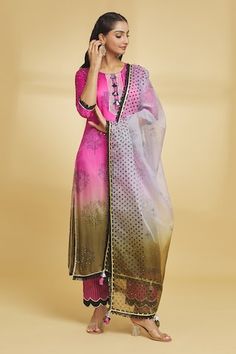 Pink ombre kurta with floral motif, tassels and lace details. Paired with a pant and dupatta. - Aza Fashions Festive Straight Kurta Sharara With Tassels, Festive Sharara With Tassels And Straight Kurta, Festival Kurta With Tassels, Diwali Sharara With Tassels And Straight Kurta, Anarkali Salwar Kameez With Tassels And Traditional Drape, Designer Salwar Kameez With Tassels For Eid, Designer Wear Dupatta With Tassels For Diwali, Diwali Salwar Kameez With Tassels And Straight Kurta, Designer Wear Dupatta With Tassels For Festivals