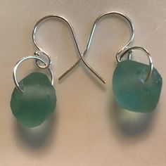 Aquamarine Green Sea Glass 11mm Rondels Sterling Silver Ear Hooks And Jump Rings Handcrafted By Pixie Life 1” Length Casual Beautiful Sea Green Comfortable Minimalist Design Boho Style Vacation Style Aesthetic Artsy Eclectic Streetwear Art To Wear Casual Boho Bohemian Handcrafted Handmade Earrings Hand Crafted Pixielife Pixie Life Girl Unique Work School Dressy Fall Summer Essentials Trendy Funky Green Indie 90’s Chic Colorful Sea Green Nature Millennial Minimalist Jewelry Aqua Aquamarine Blue G Nickel-free Teardrop Earrings In Recycled Glass, Nickel-free Teardrop Earrings Made Of Recycled Glass, Everyday Green Glass Jewelry, Silver Hypoallergenic Sea Glass Earrings, Silver Hypoallergenic Earrings With Sea Glass, Hypoallergenic Silver Sea Glass Earrings, Elegant Silver Sea Glass Earrings, Everyday Round Glass Jewelry, Blown Glass Jewelry