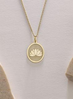 Gold Flower Lotus Pendant - Flower Lotus Gold Necklace ● Material of pendant: Solid Gold 14k ( REAL GOLD ) ● Metal Stamp: 14k ( REAL GOLD ) ● The pendant is available in 5 sizes: - 12x17 mm / 0,47 x 0,66 inches - 13x18 mm / 0,51 x 0,70 inches  In the photos - 14x19 mm / 0,55 x 0,74 inches  - 16x21 mm / 0,62 x 0,82 inches  - 18x24 mm / 0,70 x 0,94 inches ( In the photos the size is 13x18 mm / 0,51 x 0,70 inches ) ( Jump Ring inner diameter: 4 mm ) ● Material of chain: Solid gold 14k ( REAL GOLD ) It is thin and dainty and it is available in 4 sizes: - 40 cm / 15,75 inches ( Length ) - 45 cm / 17,72 inches ( Length ) In the photos - 50 cm / 19,68 inches ( Length ) - 55 cm / 21,65 inches ( Length ) ● Backside engraving is FREE ( Please use the personalization box for that.) ● If you want larg Gold Oval Jewelry With Flower Charm, 14k Gold Birth Flower Necklace, Yellow Gold Flower Charm Necklace For Gift, Yellow Gold Flower Shaped Charm Necklace For Gift, Spiritual Yellow Gold Jewelry With Birth Flower, Gold Oval Necklace With Birth Flower Detail, Gold Oval Necklace With Birth Flower, Spiritual Yellow Gold Birth Flower Jewelry, Yellow Gold Flower Necklaces With Charms