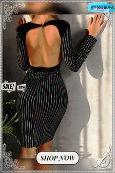 the back of a woman's dress is shown in black and white striped fabric