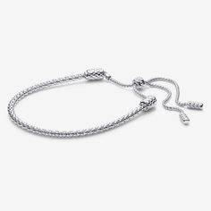 Meet the Pandora Moments Studded Chain Slider Bracelet - our iconic Studded Chain, reimagined. Move the slider to adjust the bracelet for a perfect fit - silicone on the inside keeps it in place. Functional end caps click open to add your charms, and smaller decorative end caps finish the ends of the chain. The reflective studded pattern continues throughout the chain and end caps for a camouflage effect. You can style this sterling silver bracelet with up to 10 charms or dangle charms - stack i Adjustable White Gold Chain Bracelet, Minimalist Adjustable Sterling Silver Bracelet With Box Chain, Minimalist Sterling Silver Adjustable Box Chain Bracelet, Elegant Adjustable Sterling Silver Box Chain Bracelet, Classic Adjustable Sterling Silver Jubilee Bracelet, Modern Adjustable Sterling Silver Jubilee Bracelet, Modern Adjustable Sterling Silver Bracelet With Box Chain, Adjustable Silver Box Chain Bracelet, Classic Adjustable Silver Chain Bracelet