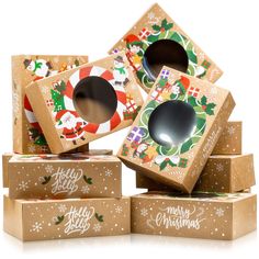 several cardboard boxes with christmas designs on them