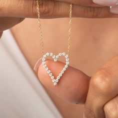 Celebrate love with our stunning Diamond Heart Necklace. Crafted in 14k gold, this exquisite piece is perfect for layering or wearing alone. It makes a thoughtful gift for birthdays, graduations, anniversaries, or as a bridal gift. Embrace the timeless beauty of this elegant necklace and order now to make hearts sparkle! This is the perfect gift for mom, wife, fiancee, girlfriend, valentine, daughter, family or friend. It is a special gift for mother's day, valentine's day, wedding, anniversary, Anniversary Yellow Gold Heart Necklace With Birthstone, Gold Heart Cut Brilliant Diamond Necklace, Valentine's Day 14k Gold Diamond Necklace, 14k Gold Heart Pendant Diamond Necklace For Anniversary, 14k Gold Diamond Cut Heart Necklace For Valentine's Day, Yellow Gold Heart Necklace For Anniversary, Fine Jewelry, Gold Open Heart Diamond Necklace With Brilliant Cut, Fine Jewelry Diamond Necklace With Heart Charm For Anniversary, Yellow Gold Heart Necklace With Diamond Accents For Anniversary