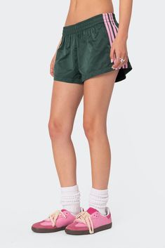 Nikki Nylon Shorts – edikted Sporty Nylon Bottoms With Built-in Shorts, Green Nylon Bottoms With Elastic Waistband, Nylon Athleisure Bottoms With Short Inseam, High Waist Nylon Shorts With Elastic Waistband, Sporty High-waist Nylon Shorts, Spring Nylon High-waisted Athletic Shorts, High Waist Nylon Sports Shorts, High-waist Nylon Sports Shorts, Spring High-waisted Nylon Athletic Shorts