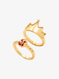 two gold rings with crowns on them, one is red and the other is yellow