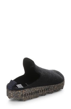 Contemporary-chic style and everyday comfort merge in this slip-on sneaker mule featuring a soft wool upper and shock-absorbing cork sole. 1 1/2" heel; 1" platform; 1/2" slope (size 39) Contoured footbed Shock-absorbing outsole Wool upper and lining/cork and latex sole Made in Portugal Black Textile Slip-ons With Rubber Sole, Casual Slip-on Clogs With Cork-bed Midsoles, Wool Clogs With Cushioned Footbed And Round Toe, Comfortable Slip-on Slippers With Round Toe, Wool Clogs With Rubber Sole And Round Toe, Casual Wool Slip-on Clogs, Casual Wool Slip-on Slippers, Casual Wool Slippers With Rubber Sole, Casual Clogs With Textured Sole For Outdoor