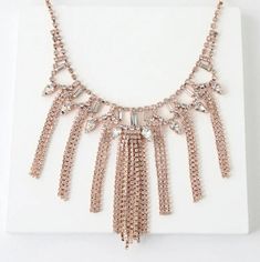 This Rose Gold Rhinestone Statement Necklace Is Sure To Get Some Attention! Clear Rhinestones In Shiny Rose Gold Settings Create An Eye-Catching Display Across This Statement-Making Necklace. Necklace Measures 16.5" Around, With A 2" Extender Chain. Lobster Clasp Closure. Man Made Materials. Glamorous Rose Gold Necklaces For Party, Glamorous Rose Gold Party Necklace, Rose Gold Crystal Necklaces For Party, Rose Gold Rhinestone Necklace For Party, Elegant Rose Gold Rhinestone Necklace For Party, Rose Gold Crystal Necklaces With Rhinestones, Rose Gold Rhinestone Crystal Necklaces, Rose Gold Crystal Necklace With Rhinestones, Rose Gold Rhinestone Crystal Necklace