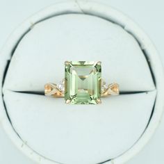 Yellow Gold Ring With Green Amethyst And Accent Stones, Green Amethyst Rings With Gemstone Accents For Wedding, Green Amethyst Rings In Fine Jewelry Style, Green Amethyst Wedding Rings With Gemstone Accents, Green Emerald-cut Amethyst Ring For Wedding, Wedding Emerald Cut Green Amethyst Ring, Wedding Green Emerald Cut Amethyst Ring, Wedding Green Emerald-cut Amethyst Ring, Fine Jewelry Rings With Green Amethyst Gemstone Accents