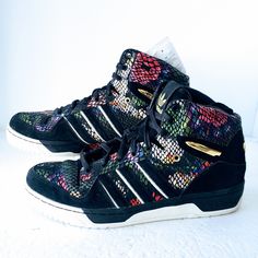 This is an authentic and rare pair of adidas Attitude Hi Big Sean sneakers in size 14. The shoes are new and have never been worn, but do not come with the original box. The colorful design features a mix of blue, orange, yellow, and green, with the recognizable adidas stripes on the side. These high-top sneakers are perfect for athletic activities or as a stylish addition to any casual outfit. The shoe shaft style is a standout feature, while the department is listed as men's shoes. The product Multicolor Basketball Shoes With Boost Midsole For Streetwear, Multicolor Sneakers With Boost Midsole For Streetwear, Multicolor Boost Sneakers For Streetwear, Multicolor Skate Shoes With Boost Midsole For Streetwear, Multicolor Boost Midsole Skate Shoes For Streetwear, Trendy Multicolor High-top Sneakers With Laces, Trendy Multicolor High-top Sneakers, Multicolor High-top Custom Sneakers With Laces, Adidas Lace-up High-top Sneakers For Streetwear