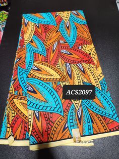 DESCRIPTION African Ankara Fabric. This is high quality African print is 100% cotton and it's 45 inches wide. It is used for making African Clothing, African quilts, & For Home decoration. FYI: Print is Double sided. The listing is for 3yards and 6yards Each piece of fabric measures: 105 - 108in by 45in for 3yards 210 - 216in by 45in for 6yards If you purchase more than one yard, you will receive one continuous piece. *If you require more than what I have listed, feel free to send me email. CARE INSTRUCTIONS:•DO NOT BLEACH•Hand wash with cold water and mild soap or Dry clean•Press with warm iron on the wrong side only. Color may be different due to your monitor Cotton Fabric With Vibrant Patterned Print, Vibrant Print Patterned Cotton Fabric, Patterned Cotton Fabric With Vibrant Print, Vibrant Print Cotton Fabric, Cotton Digital Prints With All Over Pattern, Blue Ankara, African Quilts, Clean And Press, African Ankara