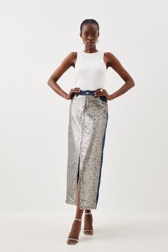 Feel Confident In Our Maxi Skirt, Made In High Quality Denim Fabric, Featuring A Statement Sequin Panel In The Front, A Straight Fit And A High Waistline For A Universally Flattering Fit. Style It With A Blouse An Heels For An Elevated Evening Look, Then A T-Shirt And Trainers For A More Casual Approach. Denim & Sequin Maxi Skirt High Quality Denim Fabric Sparkling Sequin Panel Flattering Straight Fit Thigh High Leg Split Comfortable, High Waistline Pocket Features Button Front Fastening Sequin Maxi Skirt, Maxi Sequin Skirt, Dress Leather Boots, Winter Coat Dress, Plus Size Workwear, Skirt Collection, Skirts Denim, Christmas Day Outfit, Leg Split