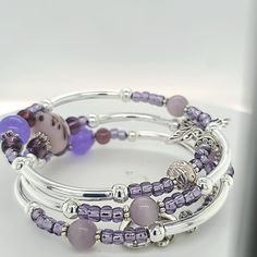 These handmade bracelets with lots of bangles that are easy to wear and simply wrapped around the wrist with no difficult-to-attach clasps. With beautiful, high quality materials, including glass beads, pewter spacers, and adorable charms, 3 Loop Memory Bracelet with a Butterfly and Heart Charm on each end. Stainless steel hypoallergenic memory wire to create a five loop, 3 loop or 1 loop bracelet which will easily adjust to the size of your wrist, and is accented with charms on each end. This a Pastel Bracelet, Memorial Bracelet, Memory Wire Bracelets, Elegant Bracelet, Memory Wire, Wire Bracelet, Pinky Ring, Toe Rings, Emerald Ring