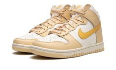 The Women’s Nike Dunk High “Pale Vanilla” is a women’s-exclusive colorway of the popular retro basketball and lifestyle shoe with a spring and summer vibe.  The “Pale Vanilla” features a white leather base with Pale Vanilla leather overlay panels.  A Topaz Gold leather Swoosh can be found on both sides of the shoe.  The orange-gold hue also appears on the “Nike” and Swoosh branding on the tongue tag.  Underfoot, a white midsole and Pale Vanilla rubber outsole put the finishing touches on this Du Sneaker Displays, Sneakers Box, Kobe Shoes, Retro Basketball, Nike Gold, Exclusive Sneakers, Basic Hoodie, Sneaker Release, Nike Dunk High