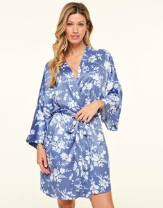 Our Izabella floral blue robe is made from soft recycled satin and features a beautiful pressed floral print. It's the perfect piece to throw over your sleepwear for a chic and romantic look. (Available in sizes XS-XL). Floral Print Satin Sleepwear For Loungewear, Satin Floral Print Sleepwear, Blue Floral Print Sleepwear, Spring Silk Sleepwear For Bedtime, Printed Blue Sleepwear For Spring, Blue Printed Sleepwear For Spring, Summer Wedding Night Floral Print Sleepwear, Summer Wedding Night Floral Sleepwear, Silk Floral Print Sleepwear For Spring