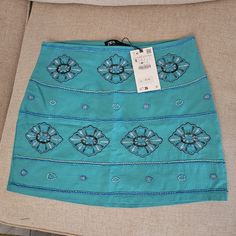 Zara Teal Beaded Mini Skirt. Fits More Like A Medium! Fitted Embellished Summer Skirt, Summer Embellished Blue Skirt, Summer Blue Embellished Skirt, Embellished Blue Skirt For Summer, Bohemian Blue Zara Bottoms, Blue Embroidered Mini Skirt, Zara Embroidered Fitted Skirt, Fitted Embroidered Zara Skirt, Fitted Turquoise Skirt For Summer