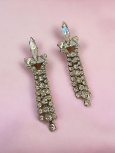 Vintage 1950s - 1960s Clear Rhinestone Dangle / Drop Earrings with Post Backing for pierced ears  Measures Approx.  1 1/2" in length  1" width at Post Back Wonderful Sparkle and Movement on these MCM Costume Jewels. Vintage Dangle Chandelier Earrings For Anniversary, Vintage Chandelier Dangle Earrings For Anniversary, Vintage Chandelier Earrings For Anniversary, Vintage Crystal Drop Earrings For Anniversary, Vintage Crystal Drop Earrings For Pierced Ears, Vintage Chandelier Earrings For Evening, Retro Dangle Earrings For Formal Occasions, Vintage Formal Crystal Earrings For Pierced Ears, Vintage Crystal Earrings For Pierced Ears