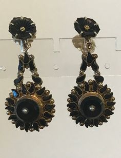 "A statement pair of long victorian gold and mainly gold-filled, ornate post pierced earrings.  It has become difficult to find these statement victorian larger drop earrings.  Condition for their age is good, they have had the post replaced, there have been old repairs-the wings for the pots are large and marked 14kt 1/20 gold filled.  Length-1 3/4\".  THE unusual paisley black jet jewels are abundant and bezel set. The majority of the metal is rolled gold or gold-filled, the carved black flowe Victorian Chandelier Drop Earrings For Evening, Victorian Chandelier Earrings For Formal Occasions, Victorian Chandelier Drop Earrings For Evenings, Victorian Chandelier Earrings For Evening, Victorian Pierced Earrings For Evening, Antique Evening Earrings For Pierced Ears, Victorian Earrings For Evening, Victorian Earrings For Evening Occasions, Victorian Clip-on Drop Earrings