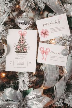 christmas tree decorated with silver ribbon and pink bowes for the bride's wedding day