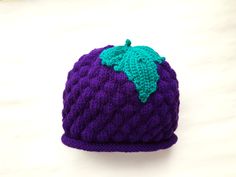 This purple grape hat is completely hand made in Sweden using high-quality yarns. It is a great winter accessory as well as a super cute birthday present.  We especially preferred to work with acrylic for this hat as acrylic is synthetic and will not irritate someone who has sensitivity to wool or animal-based products.  Acrylic headwear keeps its shape, holds its color, and is resistant to stains and wrinkles. You can put this hat to washer in sensitive program. We offer different sizes, please Cute Purple Beanie Hat, Hand Knitted Purple Hat One Size, Hand Knitted One Size Purple Hats, Hand Knitted Purple Hat, Hand-knitted One Size Purple Hat, Purple Hand Knitted Adjustable Hat, Adjustable Hand Knitted Purple Crochet Hat, Handmade Purple Winter Hat, Adjustable Hand-knitted Purple Crochet Hat