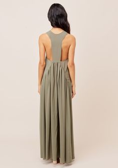 Keep it cool with our elegant, lightweight, and flowy maxi dress! Featuring a subtle tiered skirt and a sexy racerback detail. An effortless silhouette and easy boho-chic layering piece that looks great worn loose or belted for a waist-defining look. FINAL SALE Relaxed fit Sleeveless Maxi Length Scoop neckline Drop waist Model is 5'10, wearing a size S in Black.Model is 5'9, wearing a size S in Olive.Style: I-71853W-PSW Keep It Cool, Boho Chic Dress, Flowy Maxi Dress, Black Model, Tiered Maxi Dress, Drop Waist, Chic Dress, Scoop Neckline, Boho Chic