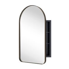 an oval mirror mounted to the side of a wall next to a shelf with shelves