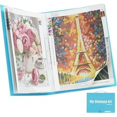 an open book with pictures of the eiffel tower and flowers in paris on it