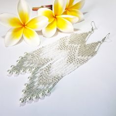 Silvery White Very Long Fringe Earrings. Sparkling, Gentle, Seed Beads Earrings. Indian Jewelry. Boho Style/ Waterfall earrings.These earrings are perfect for a wedding dress.Gradient bead earrings.Boho style Seed Beads earrings. Long Earrings. Beautiful,Sparkling, Elegant Earrings .A beautiful Christmas gift for women and girlfriend. These are long but not heavy earrings. Length of earrings 14 cm (5.50 inches). Width of earrings 0.78 inches. Materials;Czech seed beads.Czech Crystals.Japanese se Handmade Bohemian Wedding Jewelry, Bohemian Handmade Wedding Jewelry, Silver Beaded Earrings With Dangling Beads For Festival, Silver Beaded Dangle Earrings For Festivals, Dangle Earrings With Silver Beads For Festivals, Festival Dangle Earrings With Silver Beads, Bohemian Bridal Earrings For Wedding, Adjustable Silver Beaded Chandelier Earrings, Beaded Bohemian Chandelier Earrings For Party