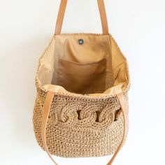 IN STOCK. SHIPPING FROM LOS ANGELES. FAST PROCESSING. Chic simple straw woven tote bag perfect for all occasions. It makes a great accessory for a day of errands or a night out, adding a touch of beachside glamour to any ensemble. Magnetic button closureFaux leather handleSize approximately 12"H x 15"W x 6"DStrap drop length: 10 inches Designer Style ID: 8675 Chic Straw Woven Tote Bag, Vintage Vibes, Summer Bag, Everyday Shoulder Bag, Beach Bag Brown Braided Bags For Beach Season, Braided Jute Bag For Vacation, Brown Braided Bucket Beach Bag, Brown Braided Crochet Bag For Beach Season, Rectangular Braided Bag For Everyday, Eco-friendly Brown Braided Shoulder Bag, Brown Braided Bucket Bag For Vacation, Eco-friendly Braided Brown Bag, Braided Shoulder Bag For Vacation